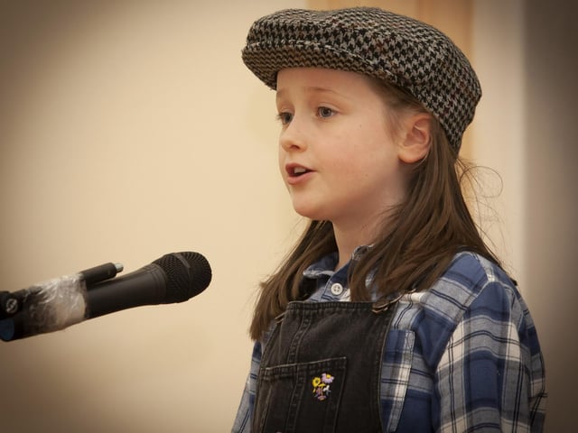 Model PS pupil Anna performing on stage at the Model PS during the Mayor’s visit on Monday.