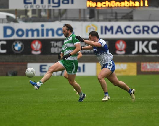 Ballinderry’s Oisin Duffin chases Faughanvale’s Michael Sweeney during Sunday's thrilling draw in Celtic Park. Photo: George Sweeney