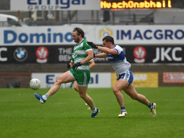 Ballinderry’s Oisin Duffin chases Faughanvale’s Michael Sweeney during Sunday's thrilling draw in Celtic Park. Photo: George Sweeney