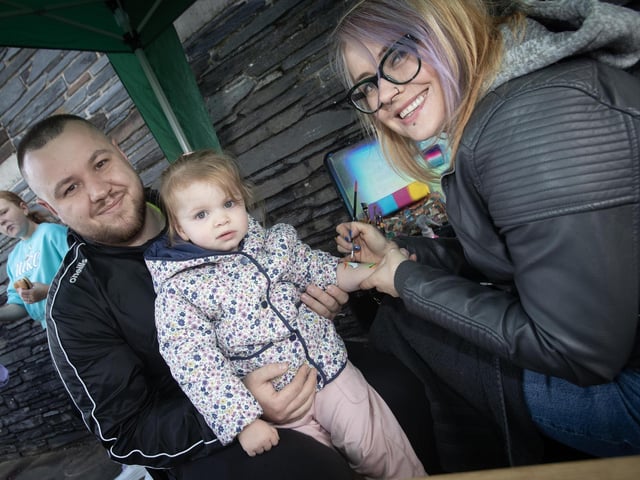Little Lyla Macari happy pictured with dad Cillian at the Greater Shantallow Area Partnership's End of Summer Festival at St. Brigid's College on Saturday last. (Photos: Jim McCafferty Photography)