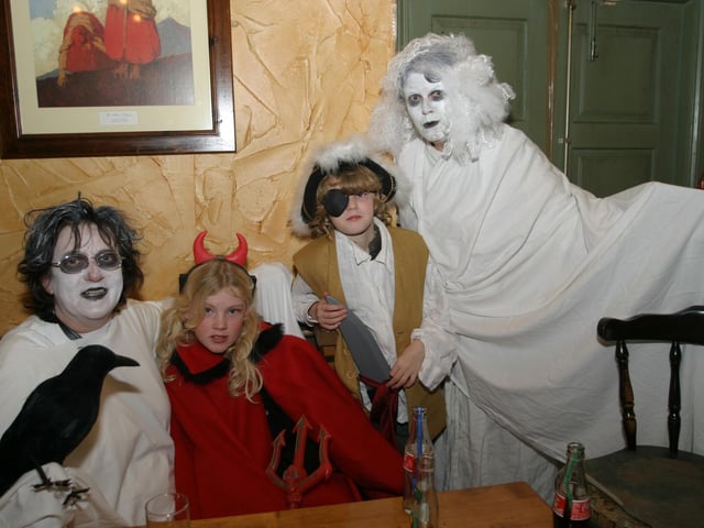 Enjoying a spooky pint on a Halloween night out in Derry