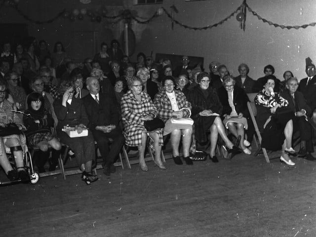 Senior citizens in the Scouts' Hall, Distillery Brae, at a function organised by Derry Community Challenge.