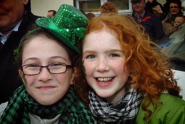 Hannah McLaughlin, left, and Rosaleen McGeehan enjoy the St Patrick's Day fun in Moville. (1903PG21)