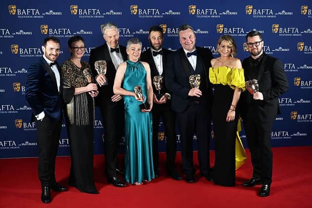 LONDON, ENGLAND - MAY 11: Martin McCann, Louise Gallagher, Stephen Wright, Amanda Black, Adam Patterson, Declan Lawn, Sian Brooke and Jack Casey pose with the Drama Series Award for 'Blue Lights' inside the Winners Room at the 2025 BAFTA Television Awards with P&O Cruises at The Royal Festival Hall on May 11, 2025 in London, England. (Photo by Stuart C. Wilson/Getty Images)