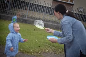 FOREVER BLOWING BUBBLES. . . Amazed to see such large balloons on Thursday.