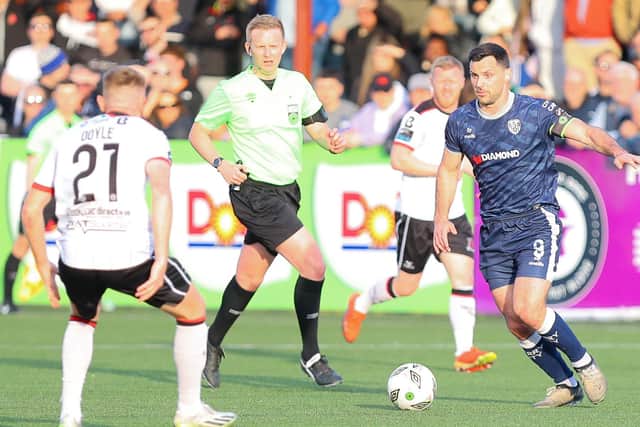 Derry City striker Pat Hoban tries to find a way past the Dundalk defence on his first return to Oriel Park. Mandatory Credit: Kevin Moore/MCIphoto