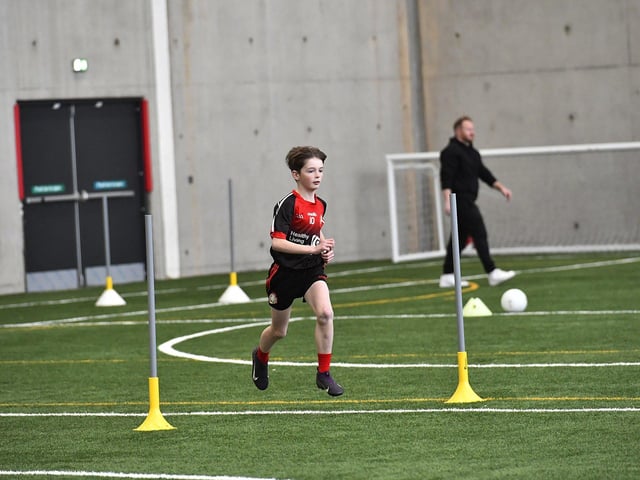 Primary School pupil taking part in the Cumann na mBunscoil skills test at Sean Dolans GAC on Friday. Photo: George Sweeney