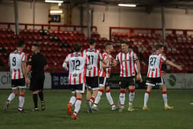 Derry City players congratulate Patrick McEleney scoring from a free kick against Institute. Photograph: George Sweeney