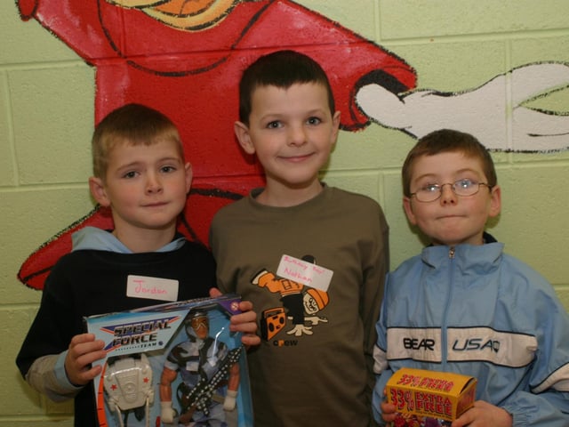 Nathan receiving his birthday presents from Jordan McDaid and Kieran McLaughlin.:Parties and nights out in Derry and Donegal in December 2003.