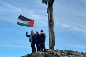 Buncrana Palestinian Support Group securing the flag.