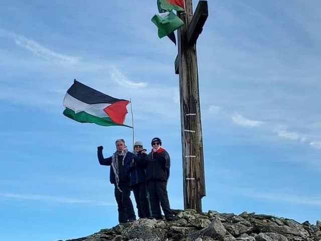 Buncrana Palestinian Support Group securing the flag.