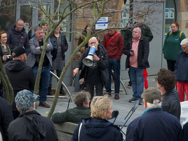 Eamonn McCann speaking to the crowd at NW Transport Hub.