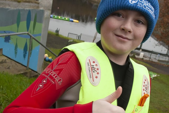 One of the young St. Joseph’s students gives the thumbs up before his pier jump on Saturday.