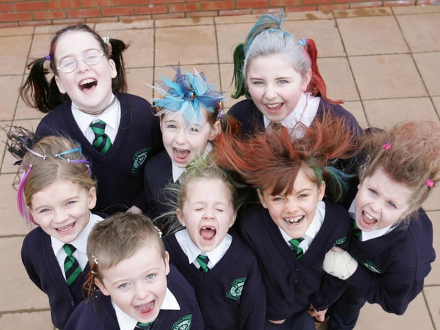 St. Patrick's Primary School pupils ahving a fun at the Bad Hair Day charity fundraiser. Front, from left, are Ethan Irvine, Sarah McCloskey, Amy Cassidy and Aileen McDevitt. Back, from left, are Laura Porter, Ciara Kivlehan, Shauna O'Neill and Grace Roddy. (1801C10) : St Patrick's Primary School's Bad Hair Day from 2005.