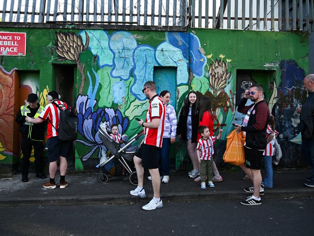 Derry City supporters enter through the turnstiles before the SSE Airtricity Men's Premier Division match between Derry City and Shamrock Rovers at Find Insurance Celtic Park in Derry. Photo by Ramsey Cardy/Sportsfile