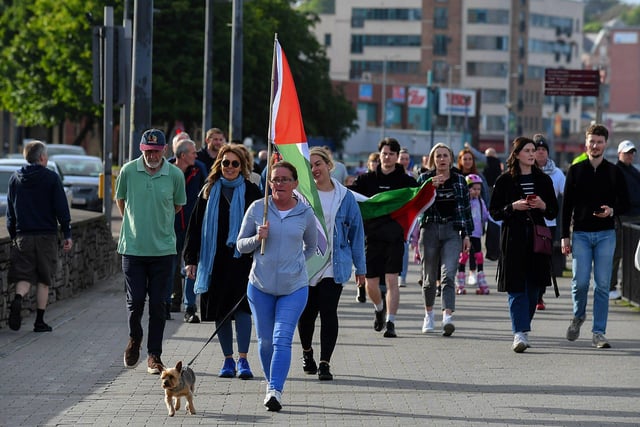 People gather for a Vigil for Gaza held on the Peace Bridge on Friday Evening, organised by the Derry Irish Palestinian Solidarity Campaign. Photo: George Sweeney