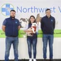 Pictured on opening day at Northwest Vets in Burt were founders Niall McSharry, veterinary surgeon, and Maria Barron, practice manager and mascot Toby, with veterinary surgeon Michael Doherty.