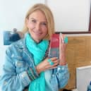 Roma Downey with her Derry Journal People of the Year Award in the 'Journal' office on Friday.