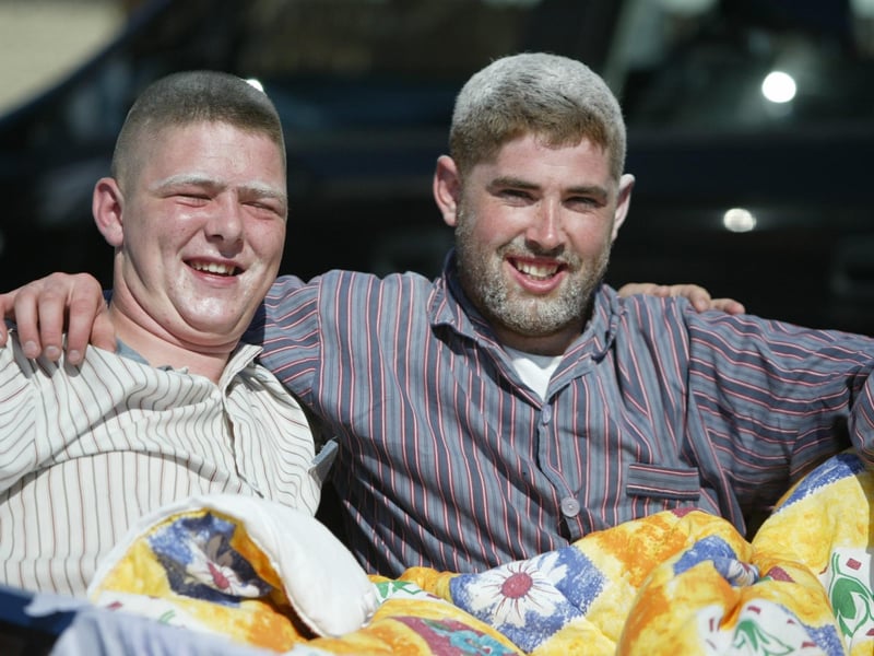 Aaron Canning and Emmett Hampton take to their bed during the parade. (2608JB46)