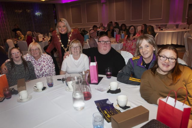 The Mayor, Sandra Duffy pictured with Foyle Down Syndrome Trust members and their families enjoying the Celebration of Achievement event.