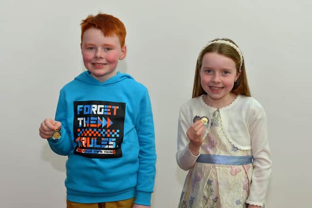 Naoise Ni Grada was awarded first place for P5 Irish Poem while Roise Ni Garda achieved first in P4 English Poem, third place in P4 Irish Poem and Highly Commended for U8 Piano at the Feis Dhoire Cholmcille on Thursday at the Millennium Forum. Photo: George Sweeney. DER2315GS –183