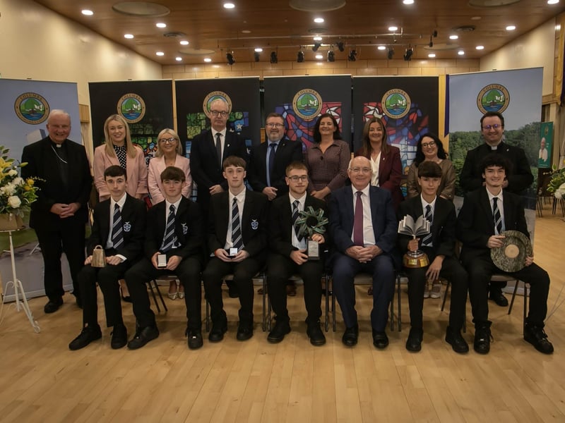 Group pictured at the St. Columb's College Senior Prizegiving on Thursday last. At back from left, Bishop Donal McKeone, Mrs Aisling Leonard (Head of English), Mrs Leanne Toner (Head of IT), Mr Liam Boyle (Head of History / Government and Politics), Mr John Johnston (VP), Mrs Sinéad McGonigle (Teacher Governor), Mrs Catherine Browne (Head of Year 12 – outgoing), Mrs Caroline McLaughlin (Principal), and Fr Stephen Ward (School Chaplain). Front from left are Rory O'Kane, Patrick Maguire, Matthew O Brien, Caiden Morrison, Mrs Paddy Kelly (Chair of the Board of Governors), Aidan Williams and Marcás McLaughlin. (Photos: Jim McCafferty Photography) : .