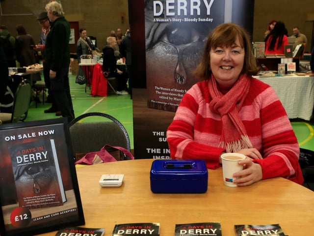 Catherine McGinty at the "4-Days in Derry" book stall. (Photo - Tom Heaney, nwpresspics)