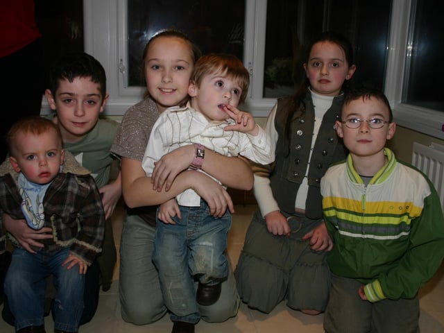 Oscar Friel centre with sister Donna and Friendsat the party. 2279/dd : Parties and celebrations January 2006: Oscar Friel.