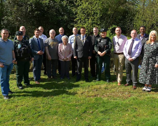2022: Group pictured at the unveiling of a memorial in St Columb’s Park on Saturday afternoon last, remembering all those who have lost loved ones on our roads. Included in the photograph were then Mayor Graham Warke and then Deputy Mayor Christopher Jackson, Life After Charity founder and chairperson Christopher Sherrard, Debbie Mullan, Life After trauma counsellor and Vice-Chairperson, local clergy, politicians and emergency services representatives.  Photo: George Sweeney. DER2216GS – 226