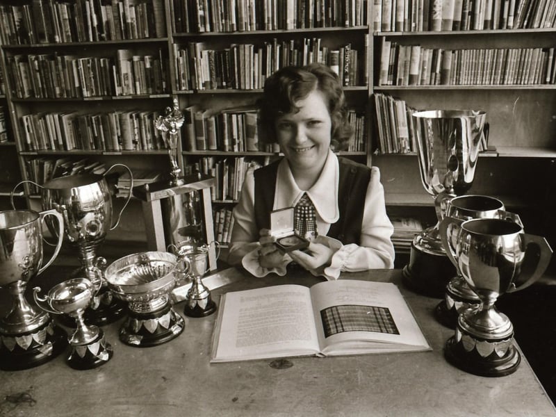 17-year-old St Mary's pupils Cathy Murray displaying her many awards for singing at her school.