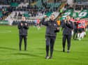 Ruaidhri Higgins celebrates the win in front of the travelling Derry City support alongside assistant boss Alan Reynolds and first team coach Conor Loughery at Tallaght. Photograph by Kevin Moore.