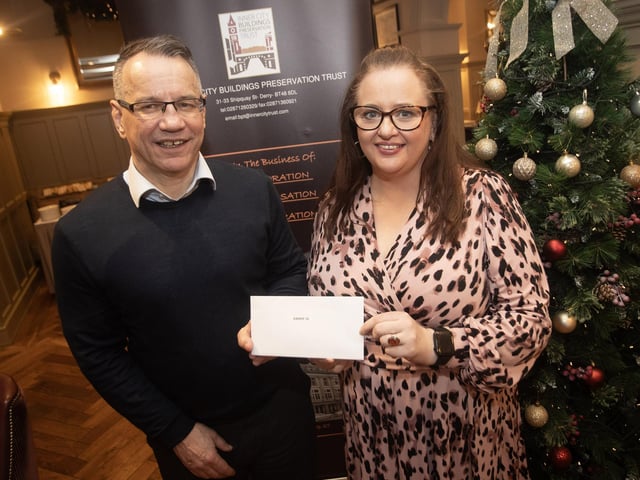 Steven Lindsay, Inner City Trust, pictured handing over a cheque to Catherine McColgan, Aware NI, at the Bishop's Gate Hotel, Derry on Thursday afternoon last. The event was part of the Inner City Trust's Annual Charity Giving. (Photos: Jim McCafferty Photography)