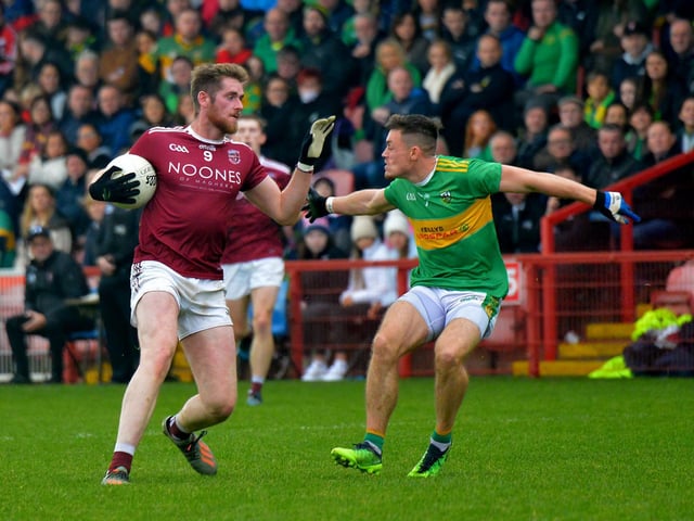 Slaughtneil’s Jerome McGuigan under pressure from Glen’s Eunan Mulholland during the Derry SFC Final in Celtic Park on Sunday afternoon. DER2243GS – 006