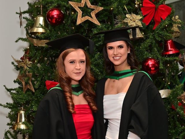 Pacemaker Press 13/12/22From L-R Aine McGarrity from Irvinestown and Aimee Skeffington from Killeeshil ,Who graduated in Nursing at the Ulster University graduation in the Millennium Forum in Derry on Tuesday.Pic  Pacemaker:.