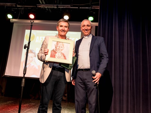 Daniel O'Donnell and Father Paul Farren.