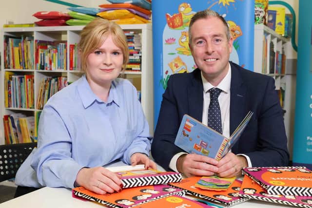 Kathryn Anderson, BookTrust’s Senior Partnerships Manager for Northern Ireland and Education Minister Paul Givan talking about Bookstart Baby packs.