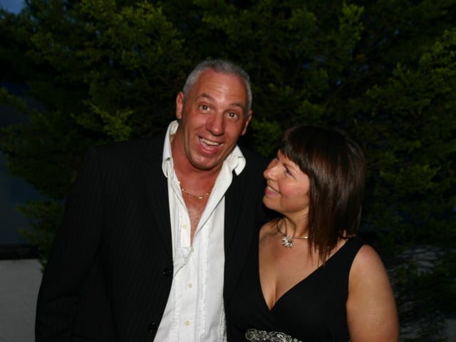 Paddy Gallagher shares a joke with girlfriend Suzanne at the big surprise 40th party. 6446dd : Triple Gallagher party.