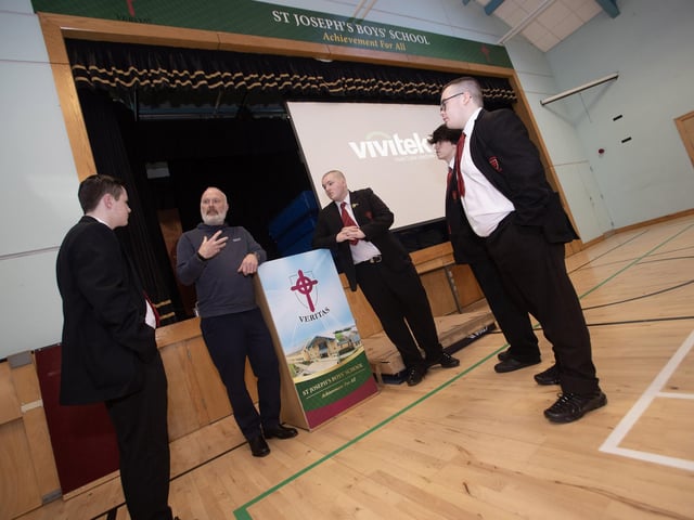 Motivational speaker Glen Hinds chatting to students at St. Joseph's Boys School on Wednesday morning. From left are Evan Curran, Michael McGavigan, Jayden Nixon and Ciaran Dobbins.. (Photos: Jim McCafferty Photography)
