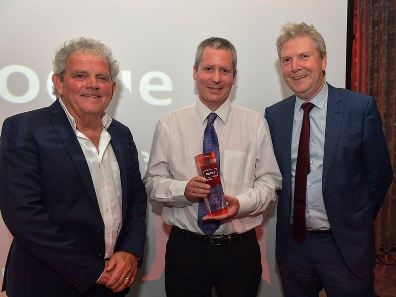 Inspirational Educator of the Year Award winner Mark Logue, St Mary’s College, receives his trophy from Professor Liam Maguire, Pro-Vice Chancellor Research Ulster University, on the right, and compere Adrian Logan.  Photo: George Sweeney. DER2325GS – 54