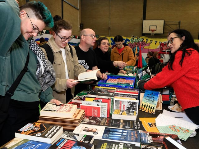 Jeni Doherty from Little Acorns busy at her stall at the Derry Radical Book Fair held in Pilot's Row. (Photo - Tom Heaney, nwpresspics)