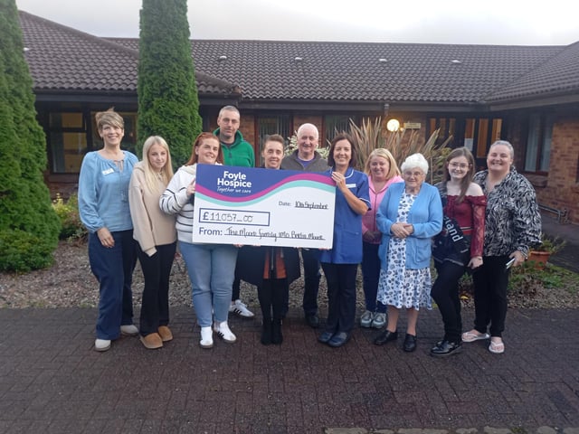 Family & Friends of the late Bertie Moore, Ballykelly, presenting a cheque to Aisling Ferry, Staff Nurse, and Sheila Duffy, Director of Income Generation & Communications, Foyle Hospice, for £11,057.00, proceeds from a fundraising raffle and Ceili held in Bertie’s memory.