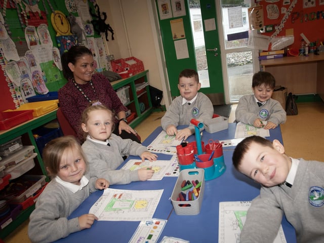 Mrs. Catherine Hegarty pictured some of her pupils at Sacred Heart PS, Waterside this week.