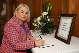 Mayor of Derry City and Strabane District Council Cllr Sandra Duffy pictured opening a Book of Condolence in the Guildhall for the victims of the Earthquake in Turkey and Syria.