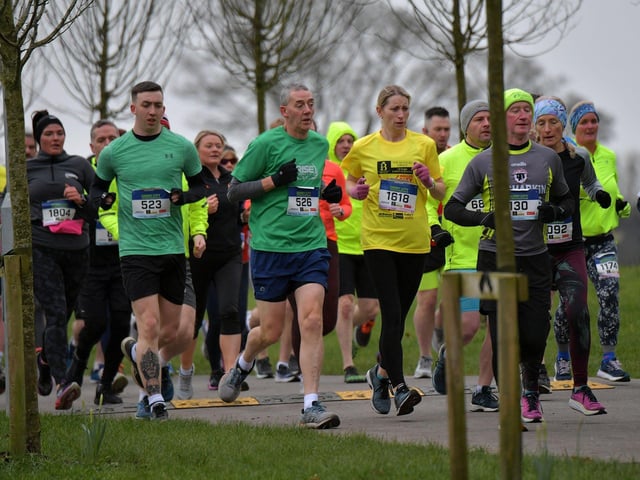 Runners make their way through St Columb’s Park during the Bentley Group Derry 10 Miler road race on Saturday morning. Photo: George Sweeney. DER2310GS – 098