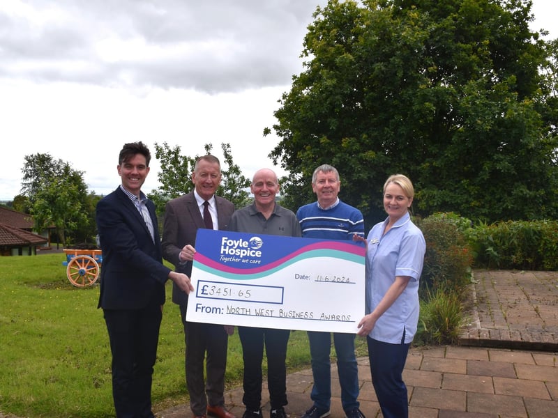 Emile Rainey from Derry's Chamber of Commerce and Jim Roddy, City Centre Initiative handing over a wonderful £3,451.65 to Foyle Hospice. The money was raised at the recent North West Business Awards where Foyle Hospice was nominated as their chosen charity. Also pictured is Day Therapy Patient, Dermot McCrossan, who kindly nominated City Centre initiative for the North West Business Awards. Foyle Hospice is so grateful for this kind gesture and want to thank everyone who donated.
