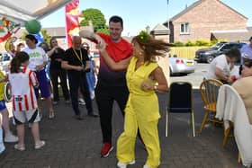 Turlough O'Neill and Margaret Cunningham dance during the Annual Farland Way Hazelbank Big Lunch. Photo: George Sweeney