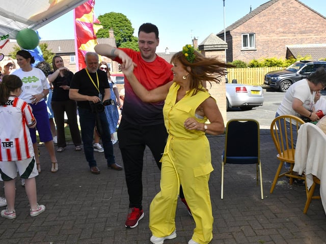Turlough O'Neill and Margaret Cunningham dance during the Annual Farland Way Hazelbank Big Lunch. Photo: George Sweeney