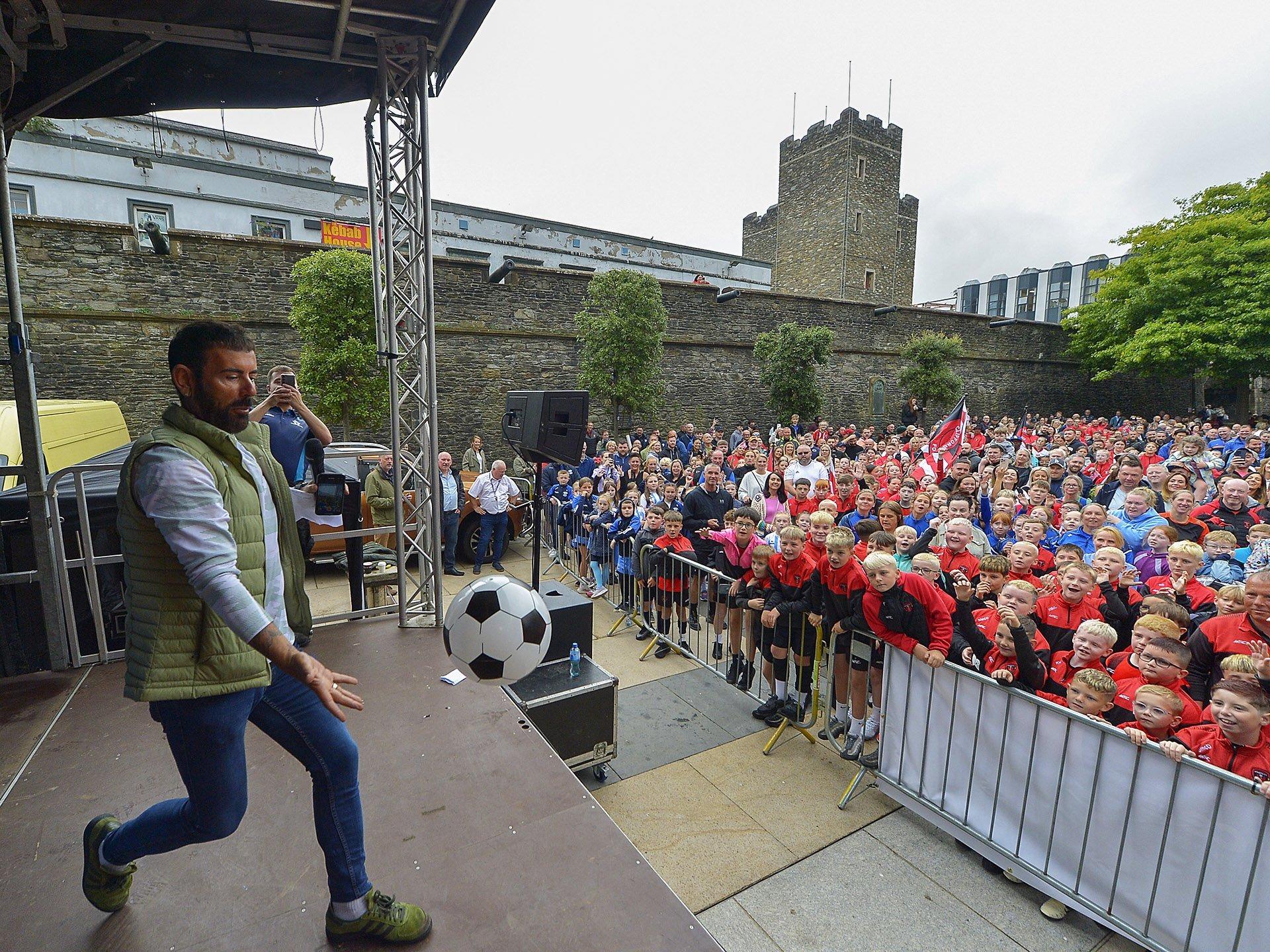 Host Mickey Doherty demonstrates his soccer skill in Guildhall Square. Photo: George Sweeney