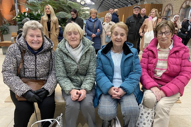 Friends Sarah Coyle, Minnie O'Brien, Sadie Guthrie and Pat McClements enjoying the performances from Lilliput Theatre Company and U3A Ukelele Band at Waterside Train Station