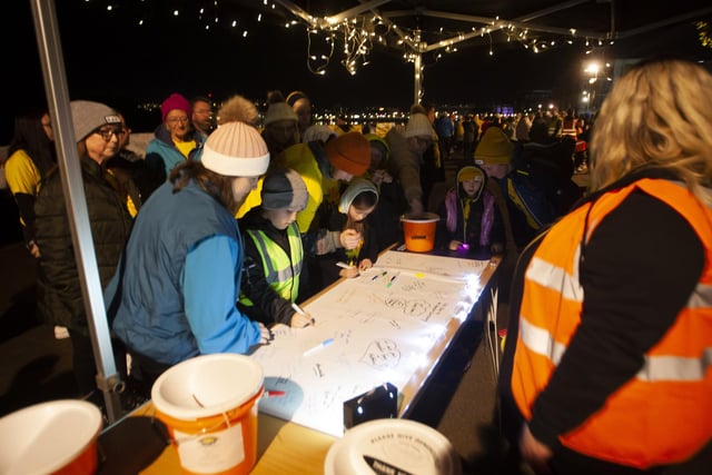 Participants signing in at the Pieta Darkness Into Light Walk in Derry on Saturday morning.